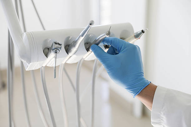 Professional Tooth Extraction technician working in Iron River, MI
